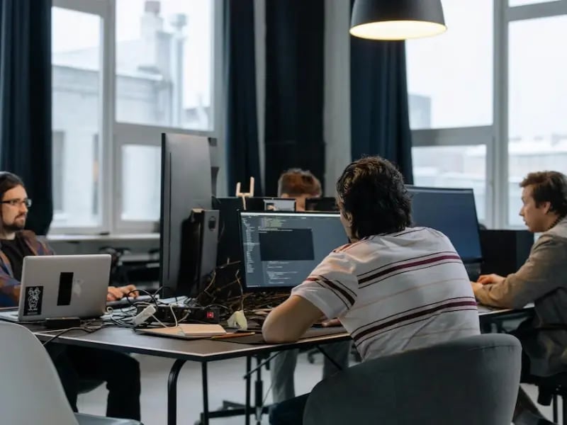 IT-guys-working-on-desktops