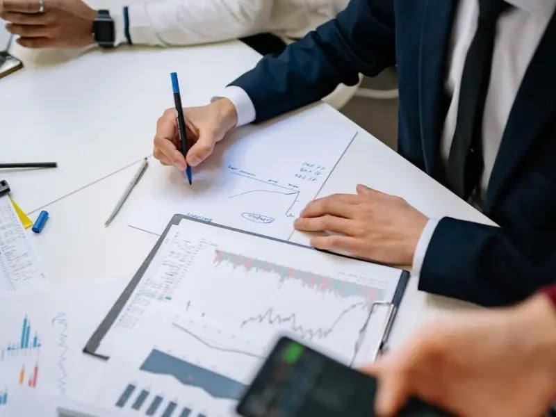 men-with-graphs-charts